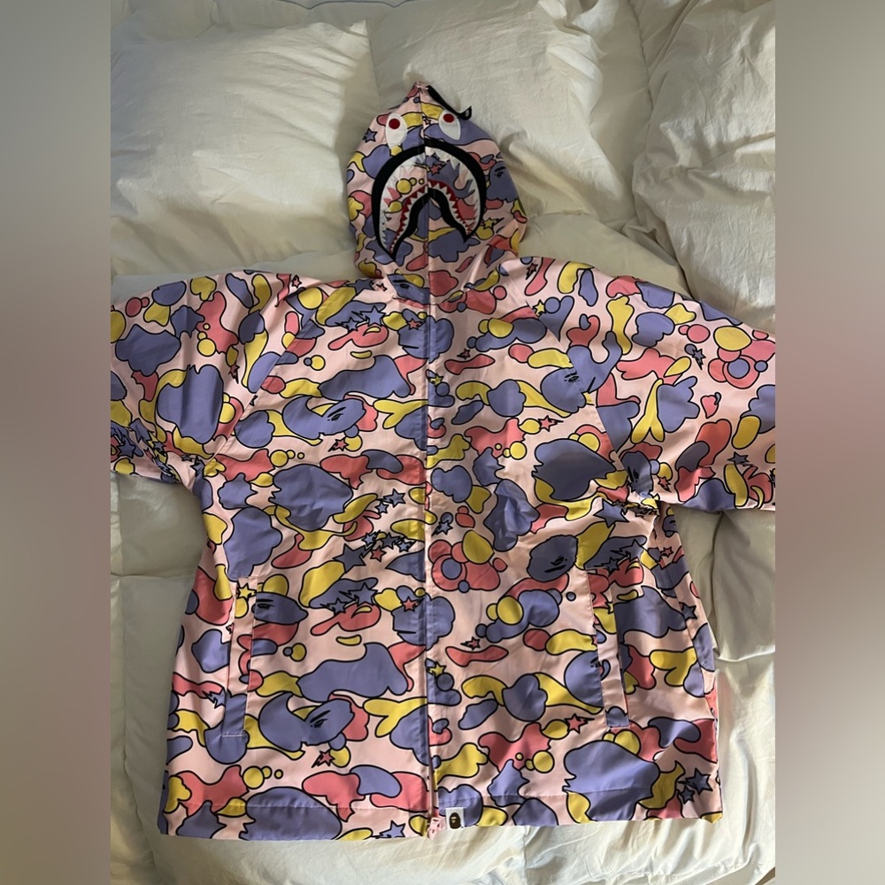 A BATHING APE®
Pastel camouflage-print hooded jacket